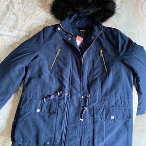 Navy blue winter parka with faux fur trim